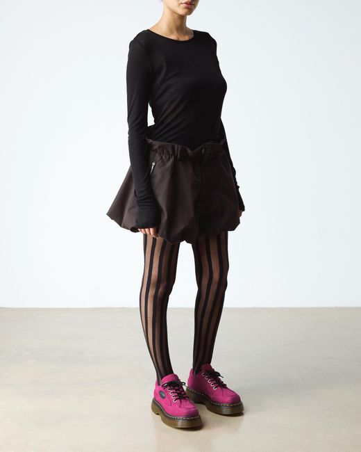 Chaussures buzz Dr. Martens en coloris Pink