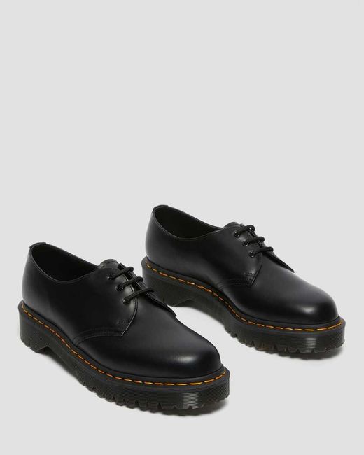 Dr. Martens Black 1461 Quad Platform Shoes
