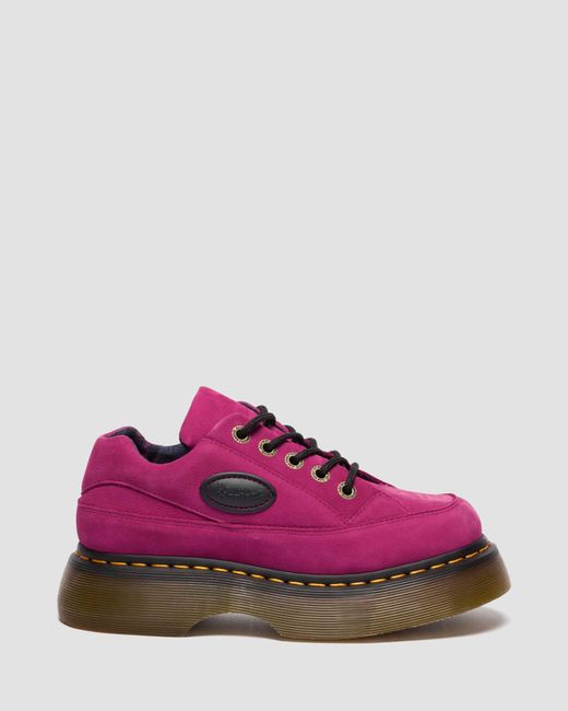 Chaussures buzz Dr. Martens en coloris Pink