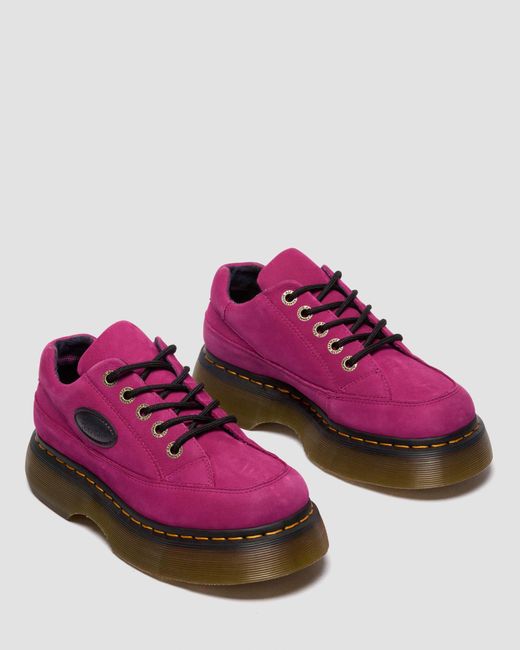 Chaussures buzz Dr. Martens en coloris Pink
