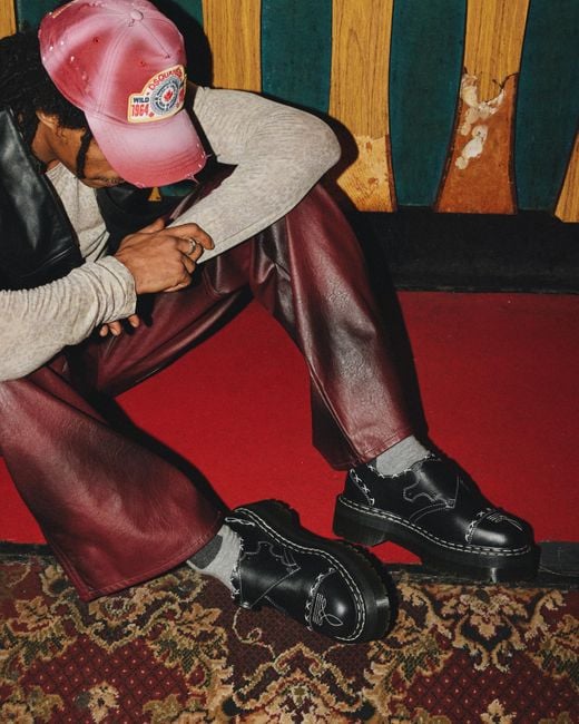 Cuir chaussures plateformes quad monk strap contrast stitch Dr. Martens en coloris Black
