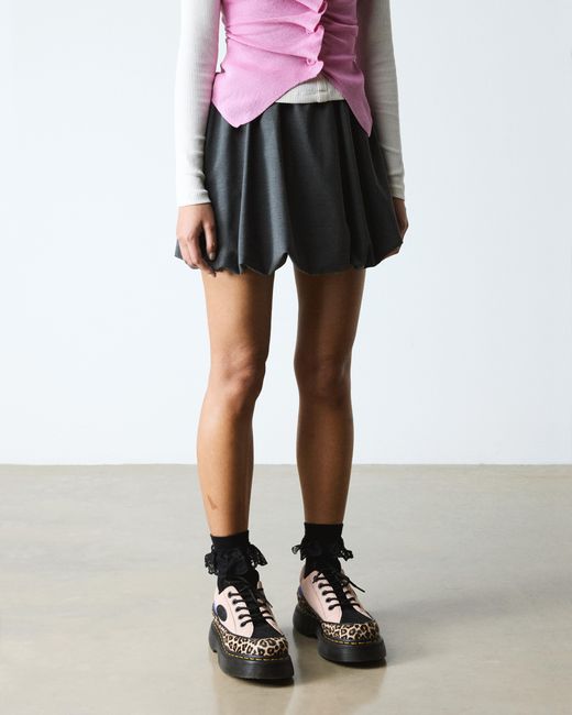 Scarpe buzz a 5 occhielli di Dr. Martens in Black