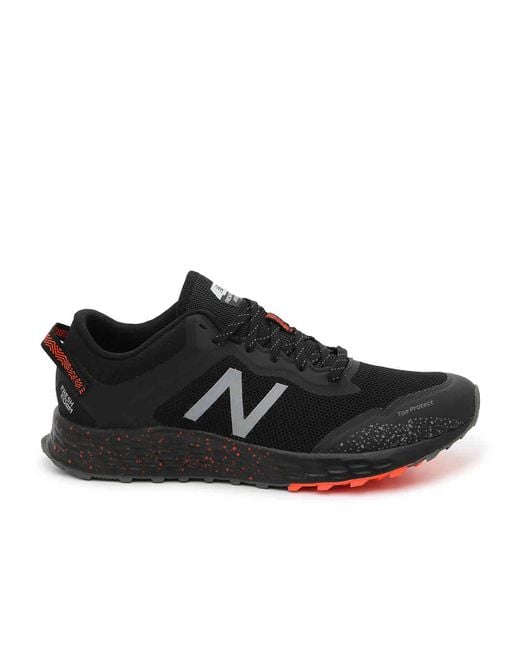 black and orange new balance shoes