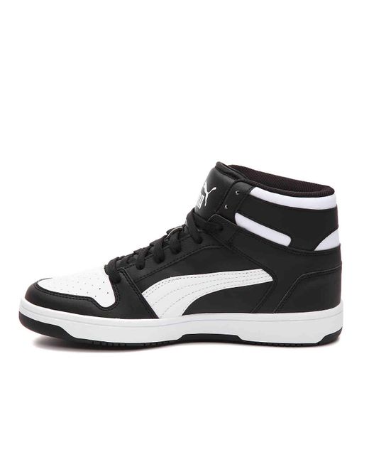 puma black and white shoe