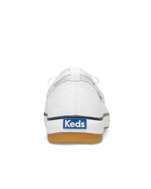 keds boat shoes white