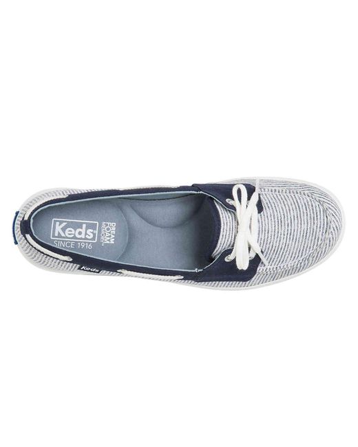 keds boat shoes white