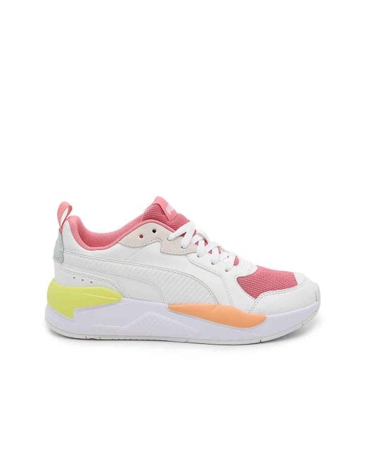 lime green and pink pumas