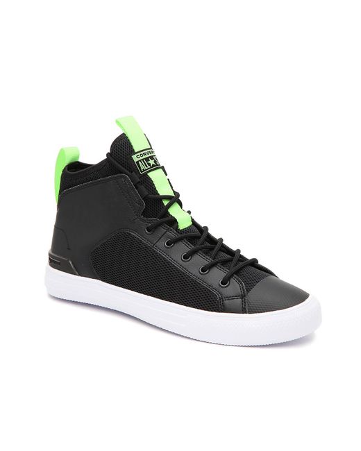 black and lime green converse