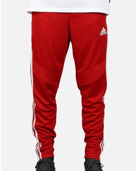 red tiro pants