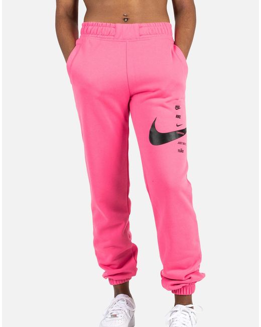 nike bottoms in light pink with drawstring waist jogger