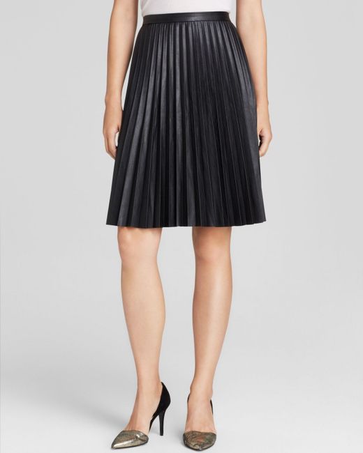 Calvin Klein Faux Leather Pleated Skirt in Black | Lyst