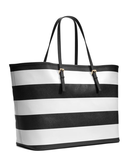 Michael kors black and white striped purse hotsell