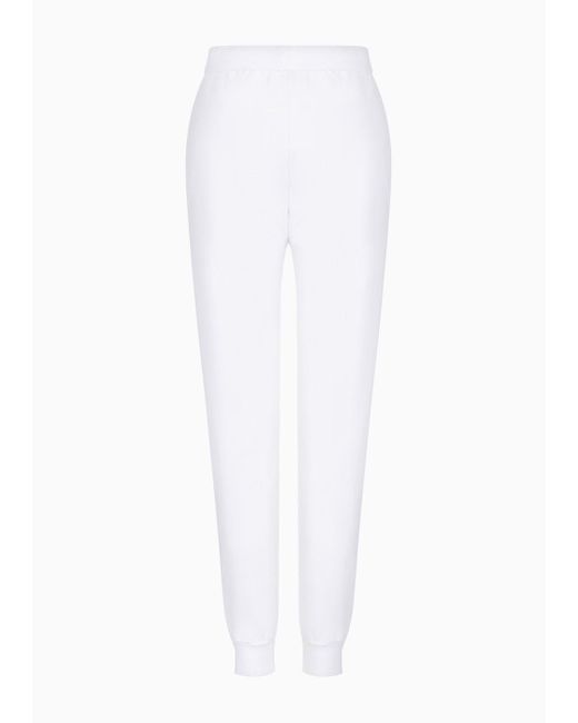 Pantaloni Joggers Shiny di EA7 in White