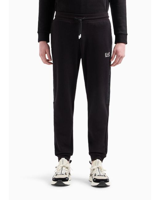 Pantaloni Jogger Logo Series In Cotone di EA7 in Black da Uomo