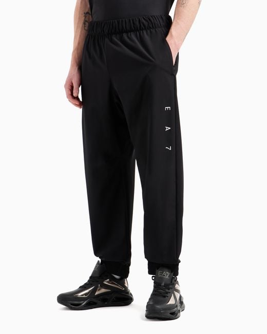EA7 Graphic Series Jogginghose Aus Elastischem Funktionsgewebe in Black für Herren