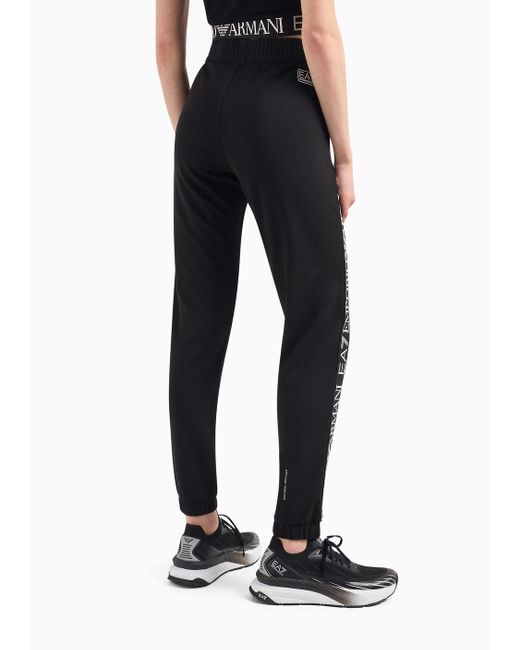 Pantaloni Jogger Shiny In Cotone Stretch di EA7 in Black