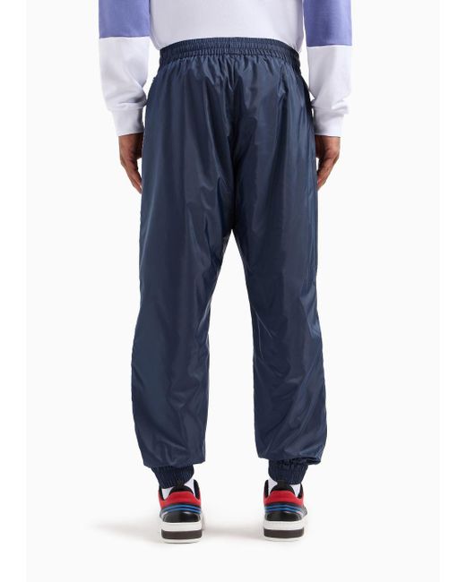 Pantaloni Jogger Graphic Series In Tessuto Riciclato di EA7 in Blue da Uomo