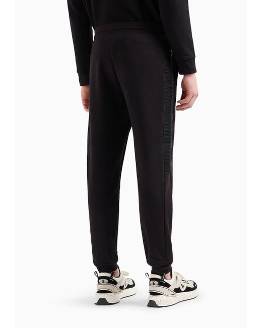 Pantaloni Jogger Logo Series In Cotone di EA7 in Black da Uomo