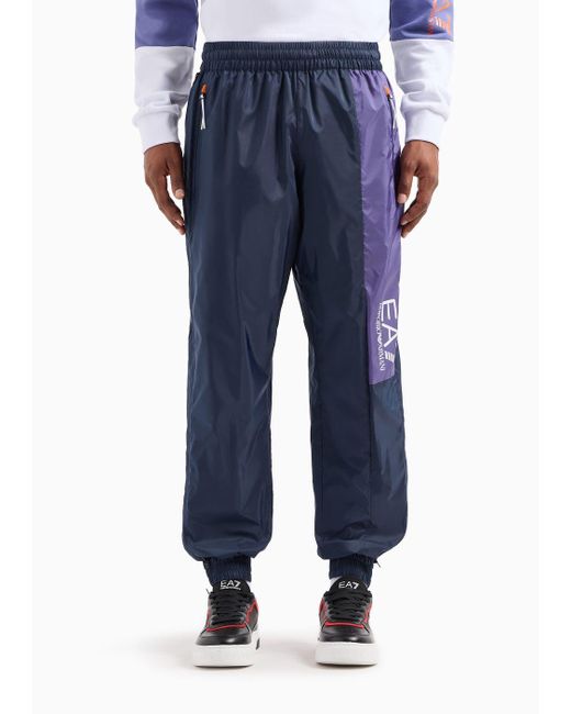 Pantaloni Jogger Graphic Series In Tessuto Riciclato di EA7 in Blue da Uomo