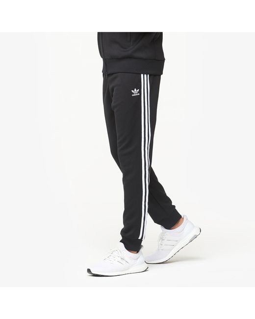 adidas track pants nike shoes