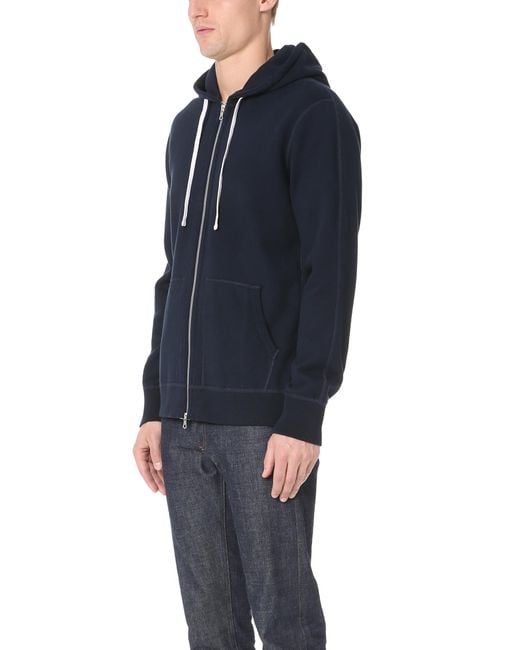 reigning champ navy hoodie