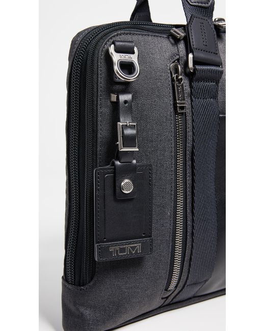 tumi aviano slim brief leather