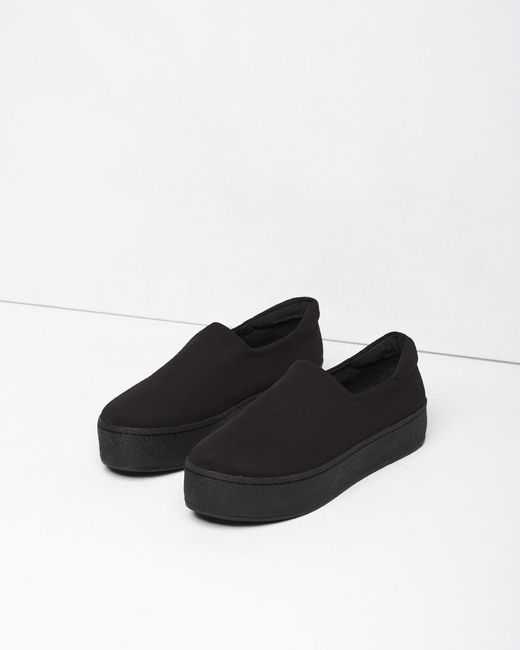 All black slip on sneakers Our cheap women’s shoes at GoJane include all the hottest looks for fall and winter. That includes comfy flats and sneakers as well as sultry, thigh-high boots and racy, lace-up heels. And with a huge assortment of colors and prints, it’s easy to find a fit for any outfit.