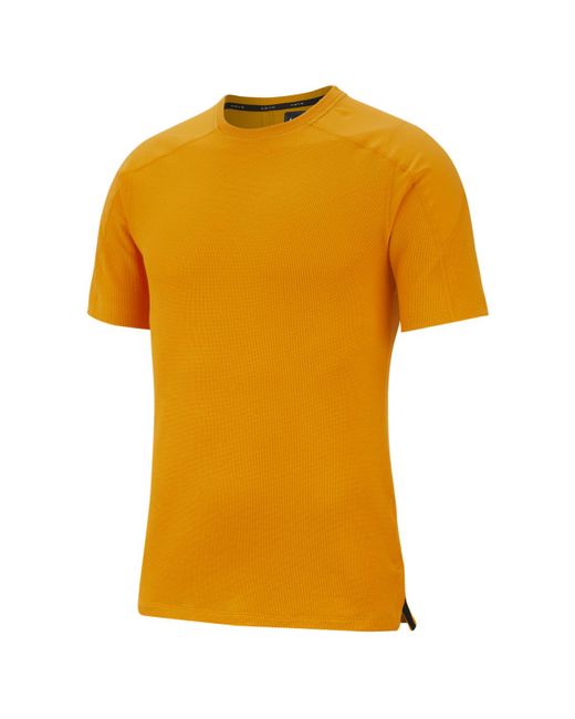 orange nike tech fit