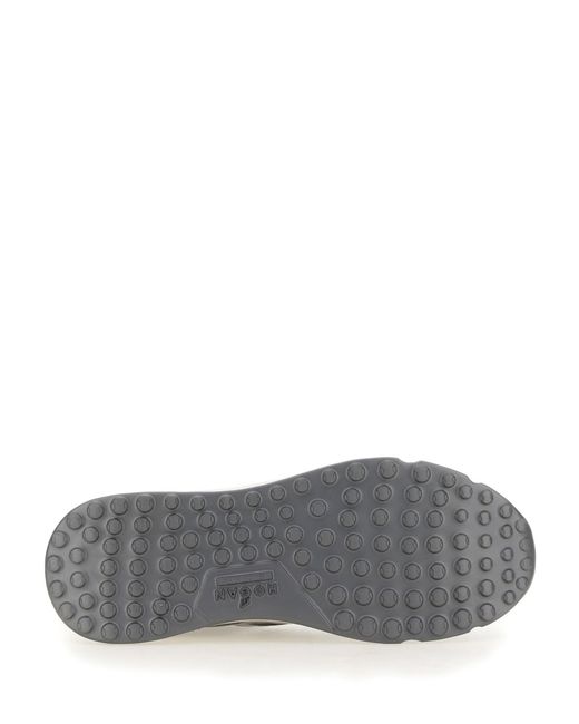 Sneakers in camoscio blu logo patch di Hogan in Blue da Uomo