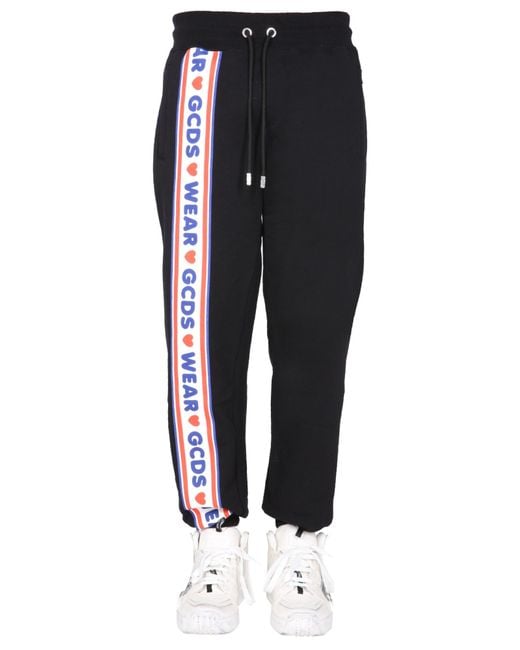 Gcds Black Jogging Pants With "Cute Tape" Logo Band for men