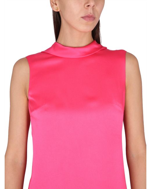 ABITO LUNGO CON SCOLLO AD ANELLO di Versace in Pink