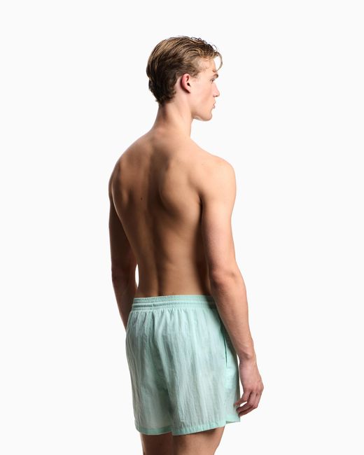 Emporio Armani Blue Swim Shorts With Stitched Logo Embroidery for men