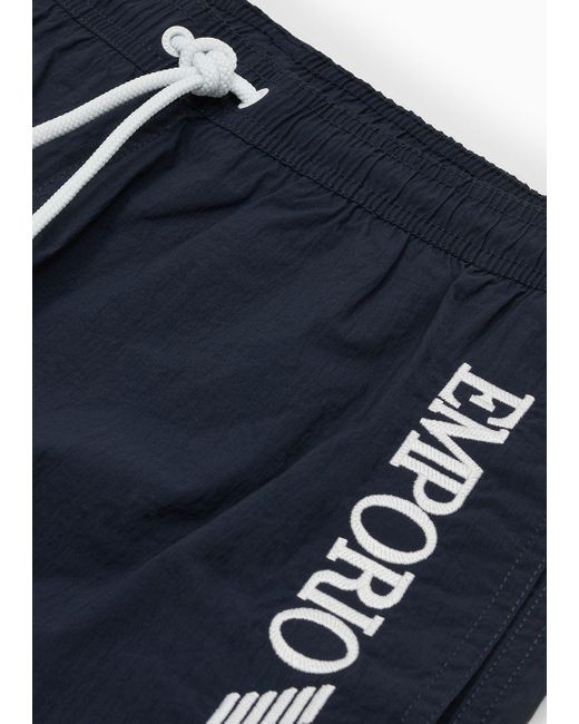 Emporio Armani Blue Crinkle Swim Shorts With Logo Embroidery On The Side for men