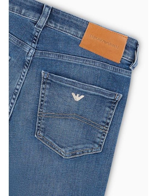 Emporio Armani Blue J47 Medium-high Waist, Flared-hem Jeans In A Worn-effect Denim