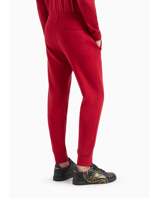 Pantaloni Jogger In Double Jersey Ricamo Drago di Emporio Armani in Red da Uomo