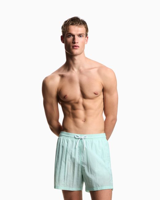 Emporio Armani Blue Swim Shorts With Stitched Logo Embroidery for men