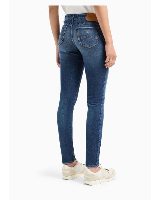 Jeans J23 Vita Media E Gamba Super Skinny In Denim Used Look di Emporio Armani in Blue