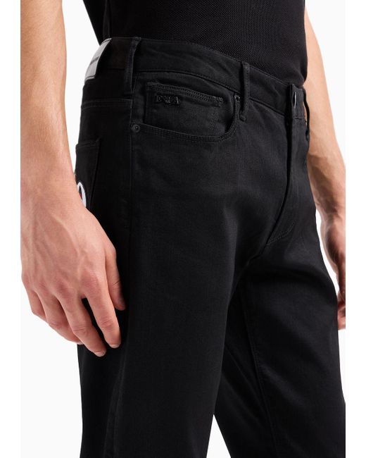 Jeans J06 Slim Fit In Denim Con Patch Love Capsule San di Emporio Armani in Black da Uomo