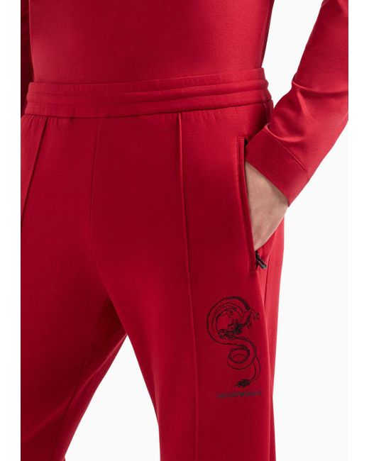 Pantaloni Jogger In Double Jersey Ricamo Drago di Emporio Armani in Red da Uomo