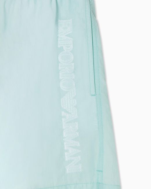 Emporio Armani Blue Swim Shorts With Stitched Logo Embroidery for men