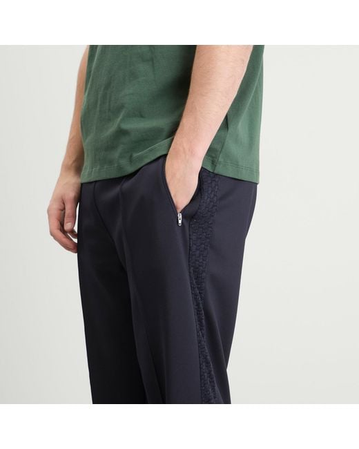 Palmes Blue Tricot Track Pants for men