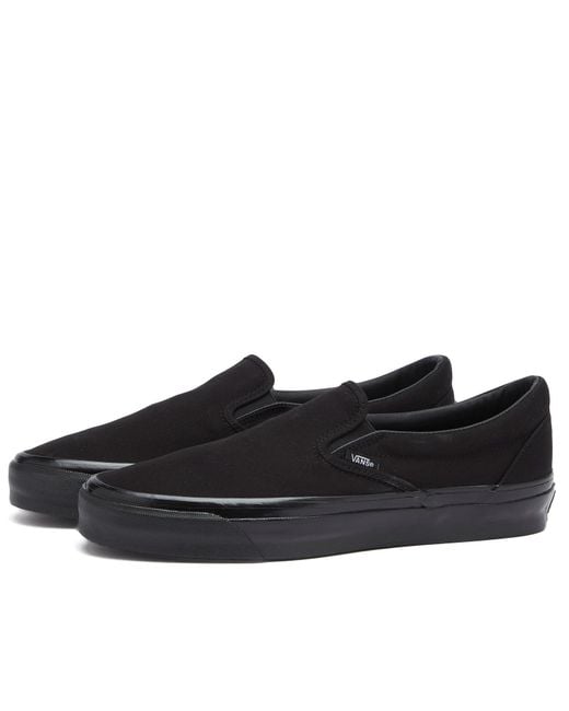 Vans Black Textile Slip-On Sneakers