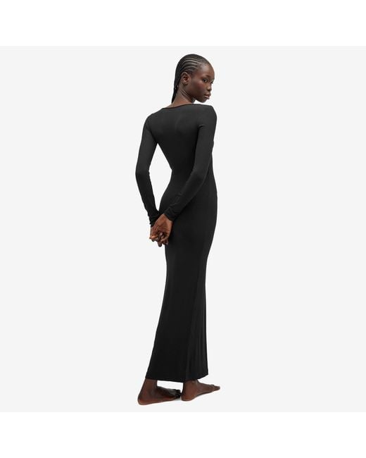 skims black dress long sleeve SKIMS Soft Lounge Long Slip Dress Onyx