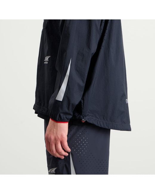 And Wander Blue X Altra Ventilation Wind Jacket for men