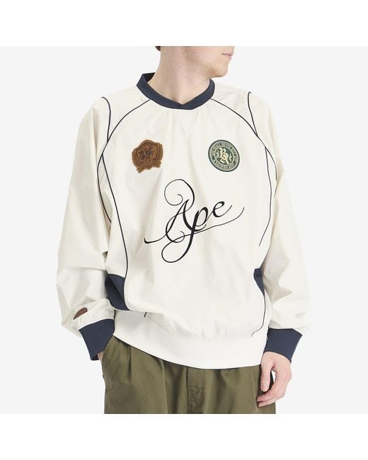 NEW【A BATHING APE】MULTI LOGO RELAXED FIT PULLOVER A Bathing Ape MULTI LOGO RELAXED FIT PULLOVER White | BSTN Store