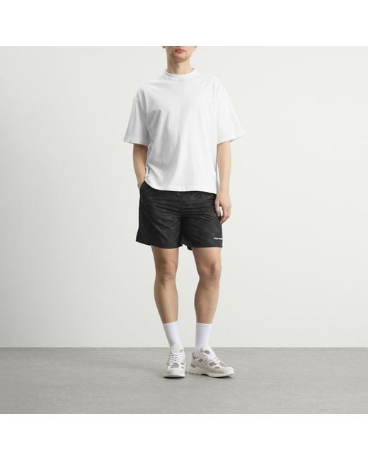 Daily Paper Black Irregular Monogram Swim Shorts for men