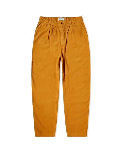 Universal Works Orange Corduroy Pleated Track Pant for men