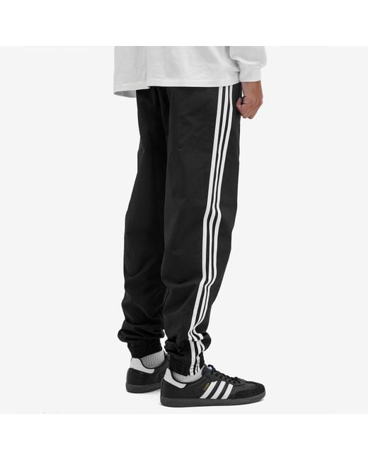 Adidas Black Woven Firebird Track Pant for men