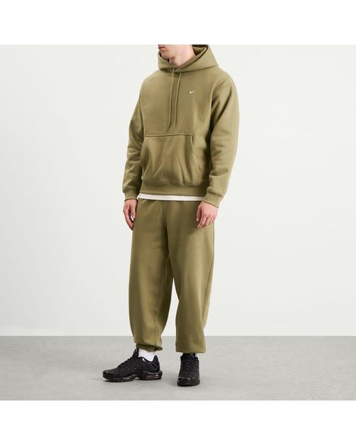 Nike Green Solo Swoosh Cuff Pant for men