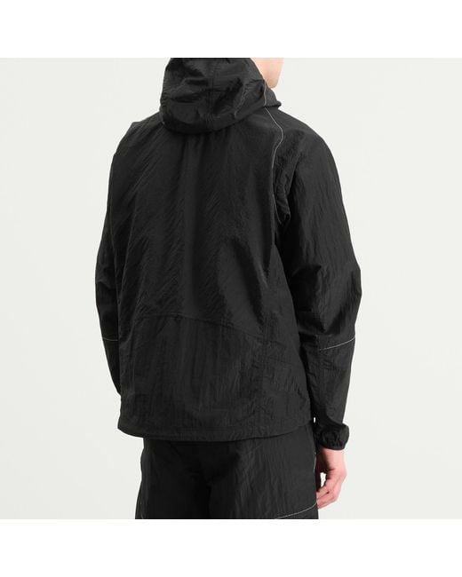 And Wander Black X Roa Ripstop Wind Jacket for men